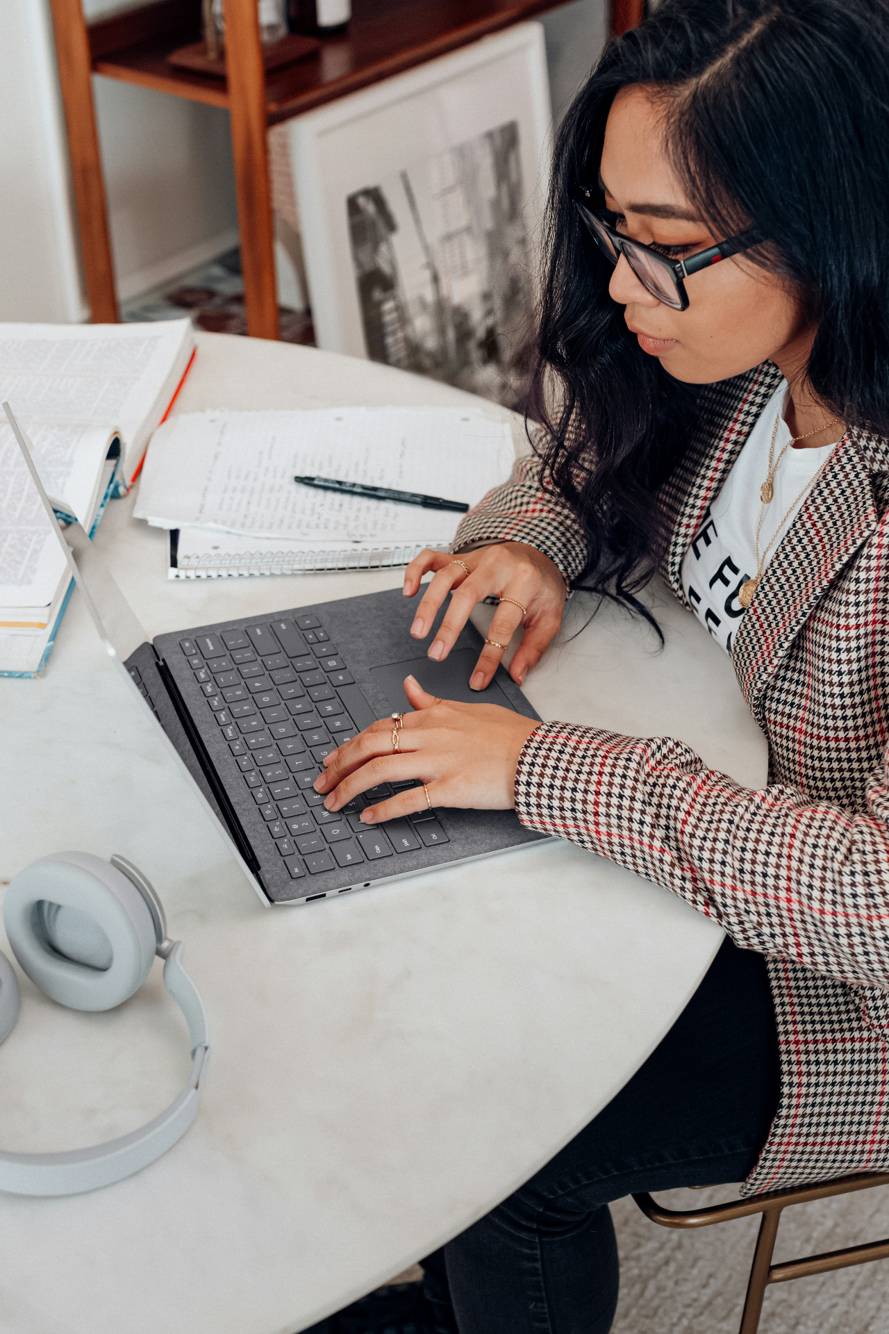 A focused business owner working from a calm workspace